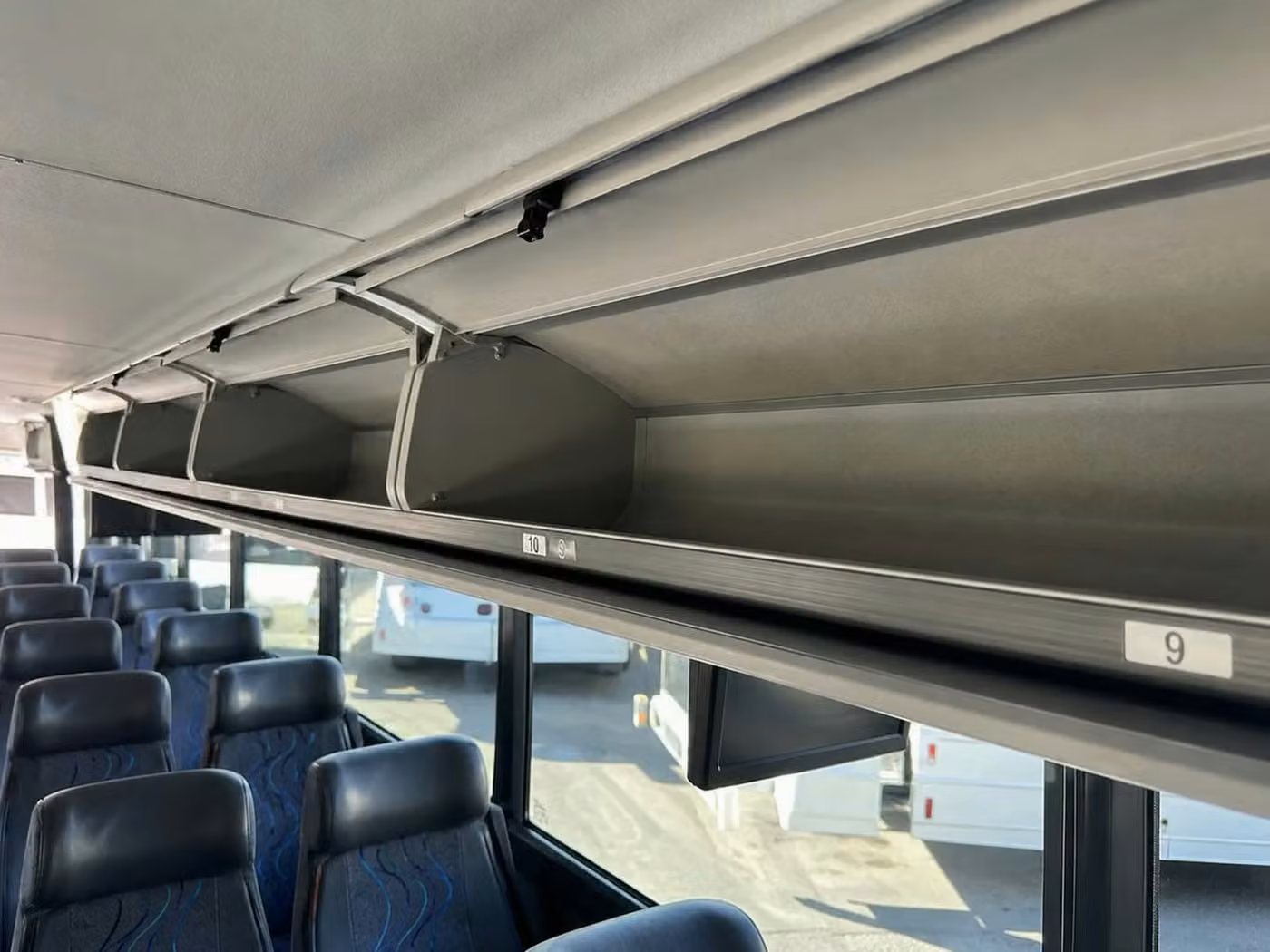 casselberry 56 passenger charter bus overhead storage